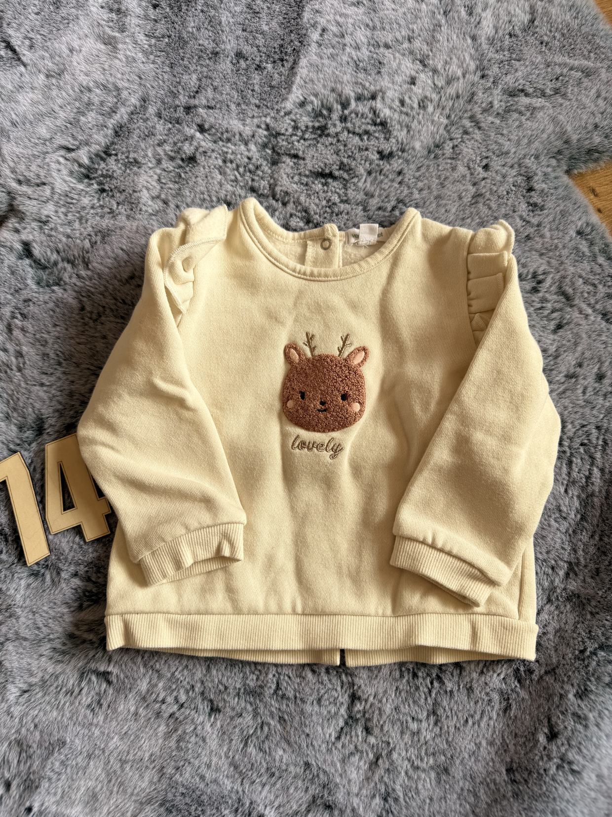 Knöpfbarer Rentier Pulli, Gr.74